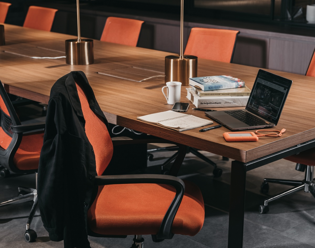 A working setup on the meeting table.