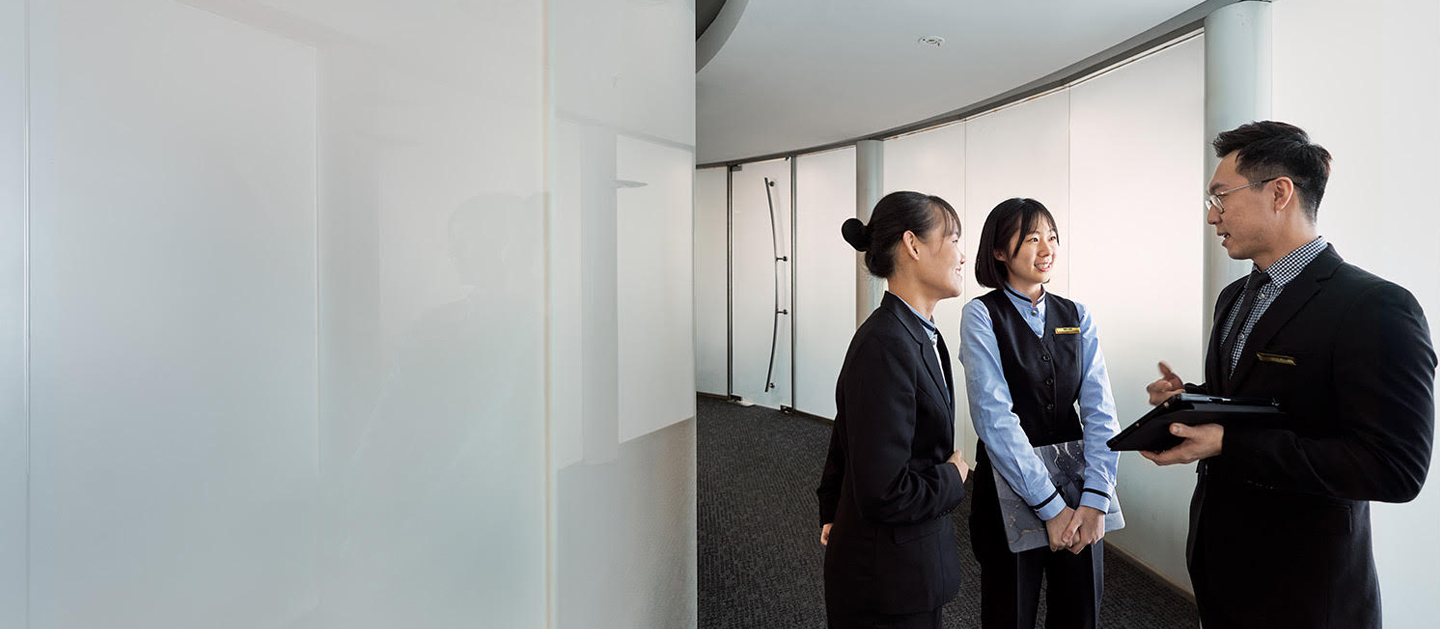 Students talking to lecturer