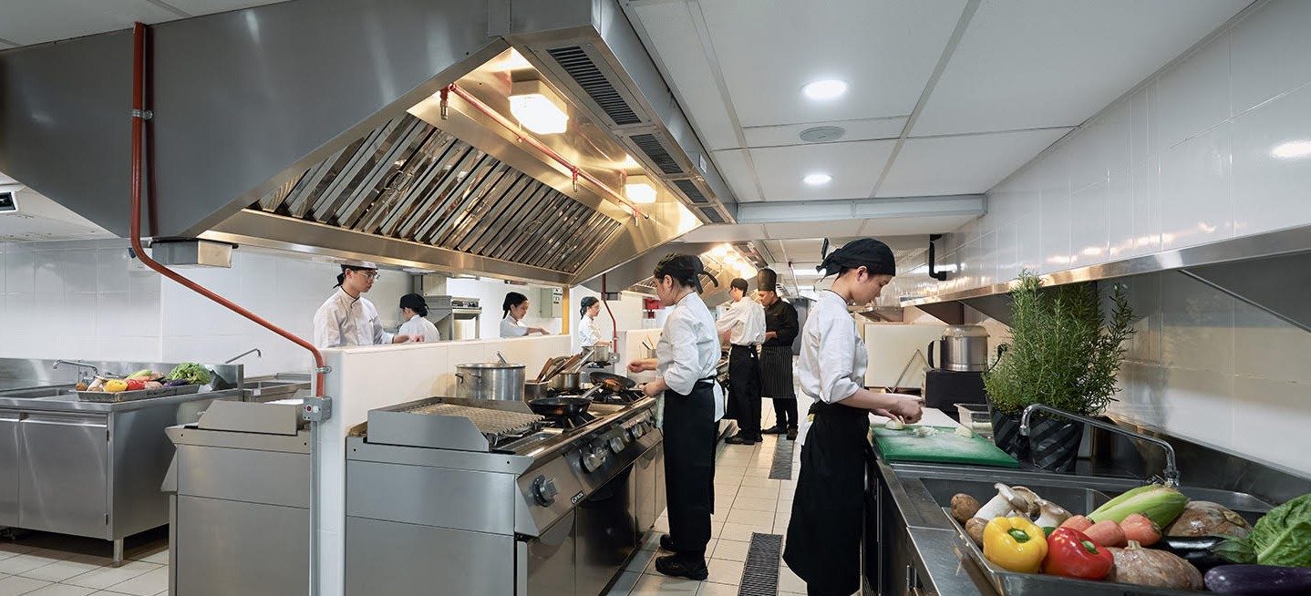 Culinary Arts Students cooking in the kitchen.