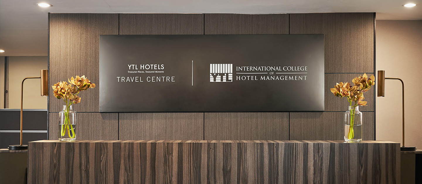 A logo of YTL ICHM.
